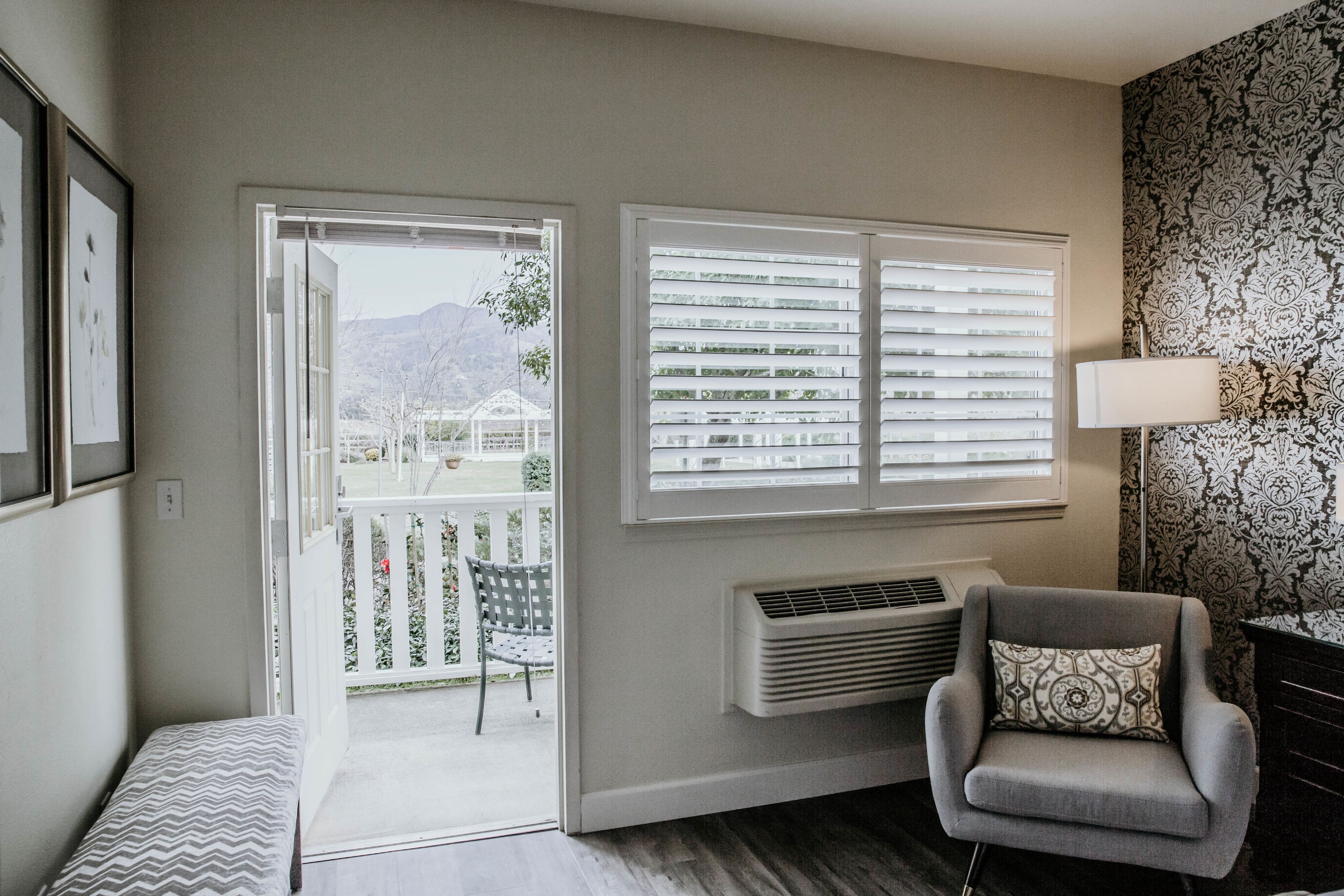 deluxe king room | living area | 50-inch tv with cable channels