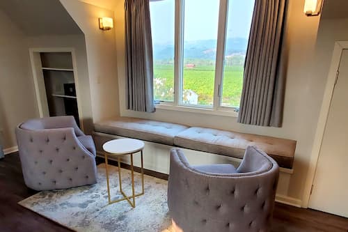 Suite (King Suite) | Living area | 50-inch TV with cable channels