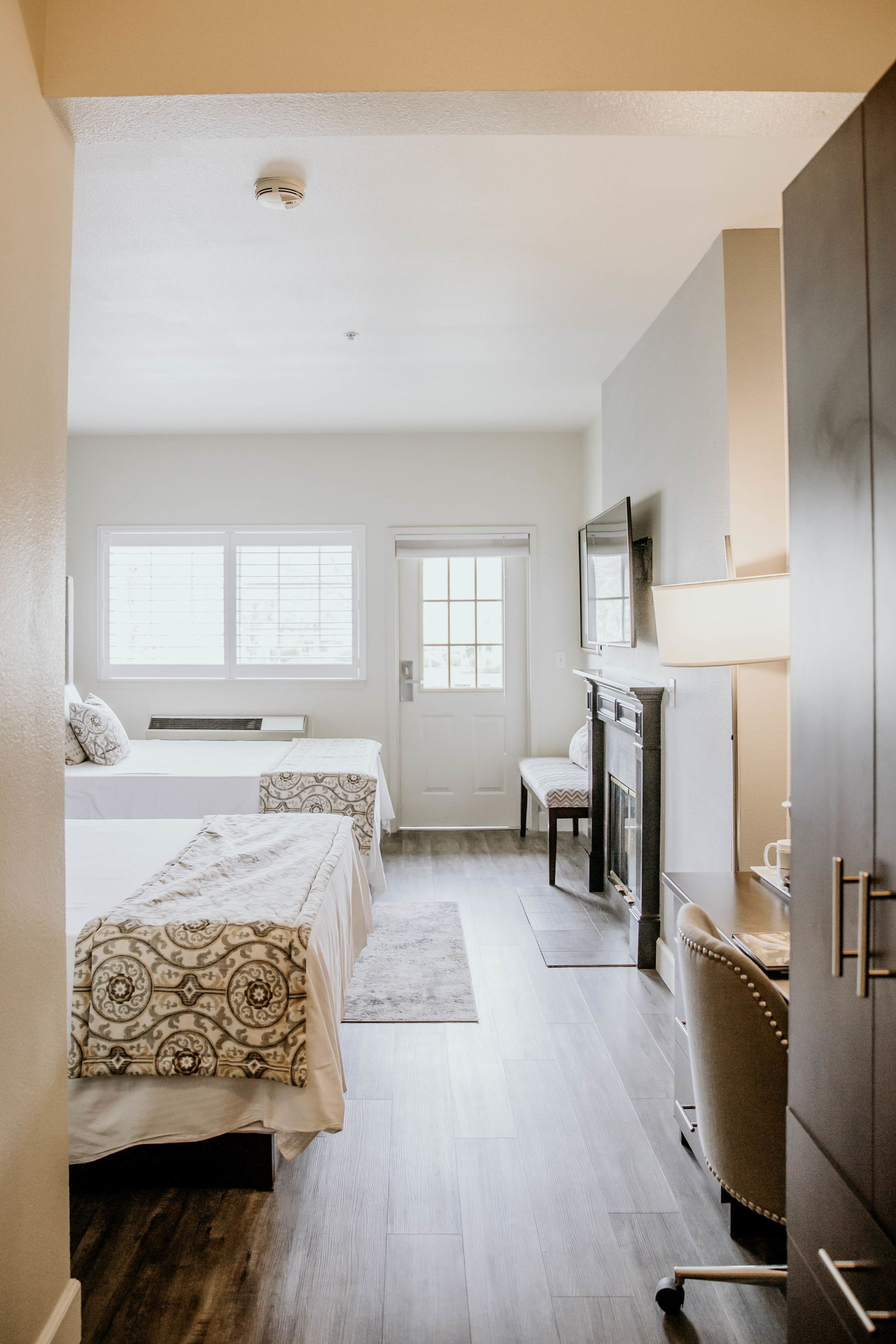 deluxe double queen room | 1 bedroom, in-room safe, iron/ironing board, cots/infant beds