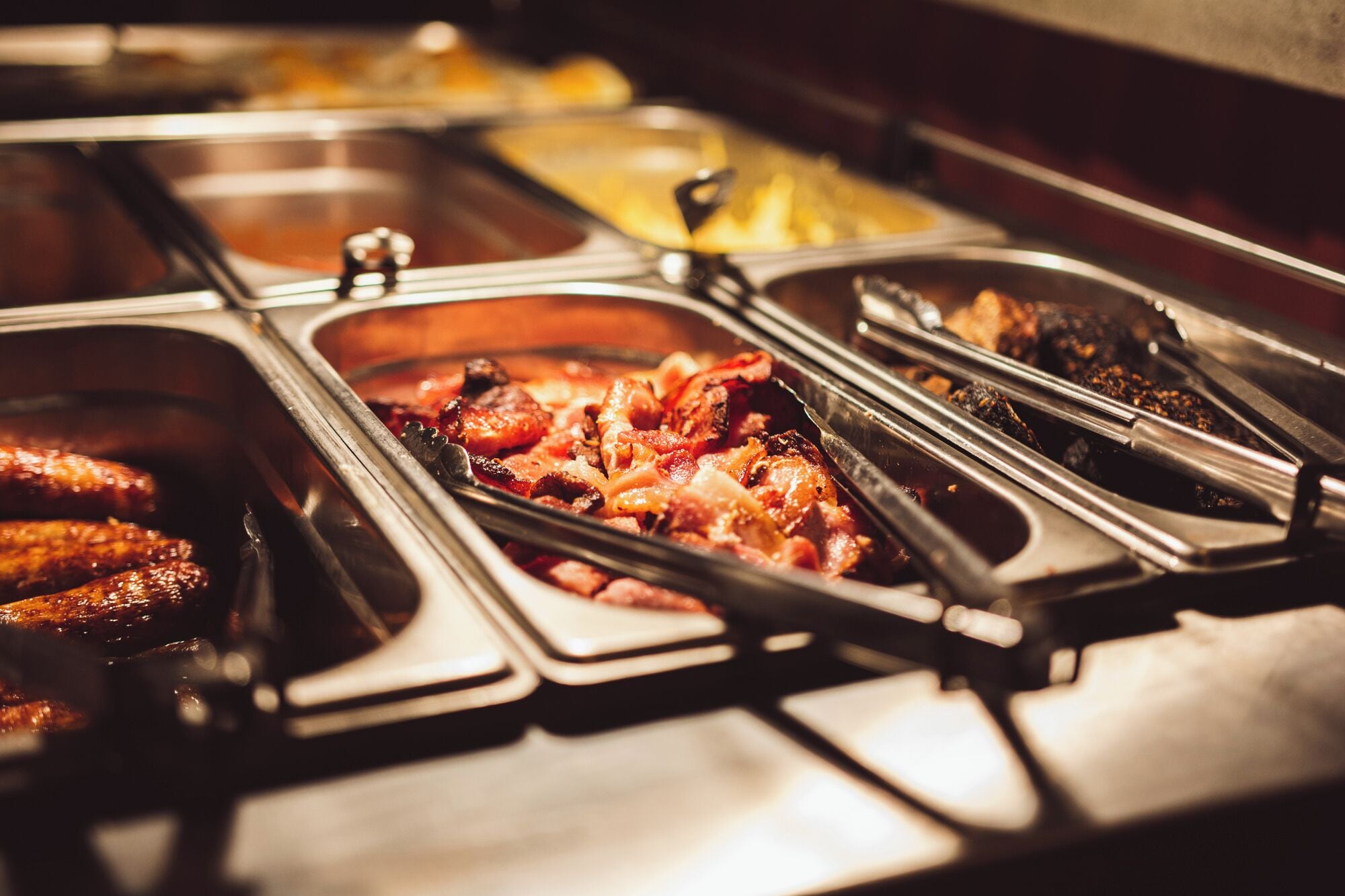 A buffet with various food options.