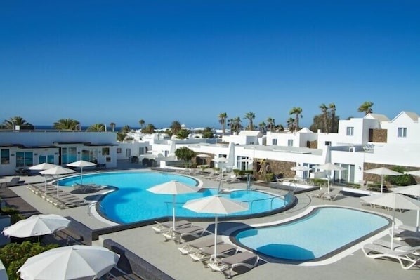 Outdoor pool, pool umbrellas, pool loungers