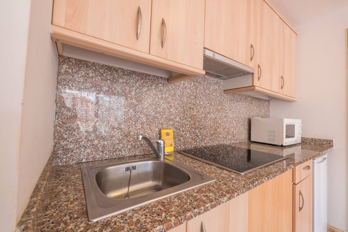 Fridge, stovetop, cookware/dishes/utensils