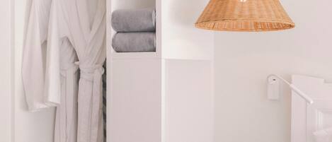 Premium bedding, down comforters, minibar, in-room safe