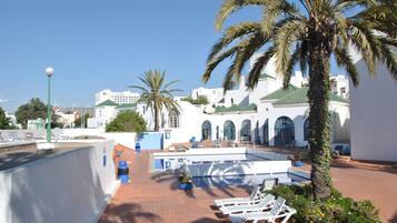 Outdoor pool, open 9:00 AM to 7:00 PM, pool umbrellas, sun loungers