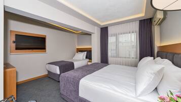 Triple Room | Premium bedding, minibar, in-room safe, desk