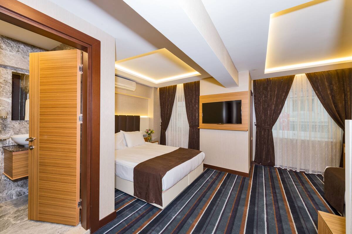 Ropa de cama de alta calidad y minibar 