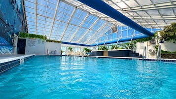 Indoor pool, seasonal outdoor pool, open 9 AM to 11 PM, sun loungers