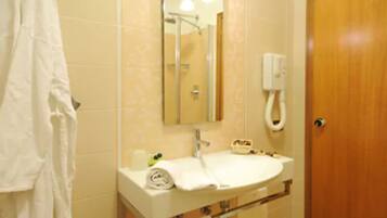 Shower, free toiletries, hair dryer, slippers