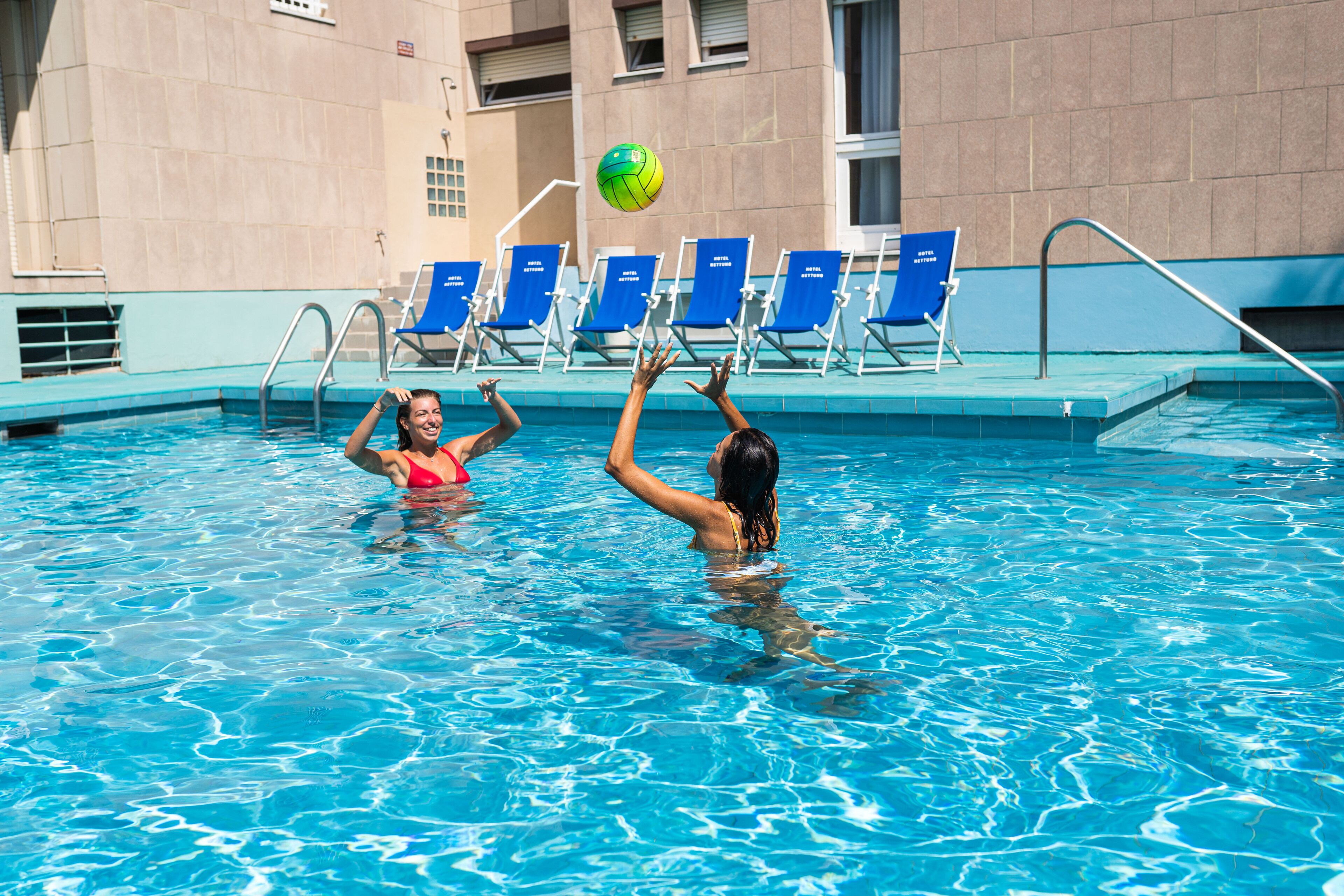 outdoor pool, open 9:00 am to 7:30 pm, pool loungers