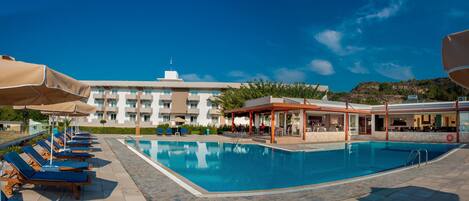 Outdoor pool, open 8:00 AM to 8 PM, pool umbrellas, sun loungers