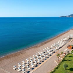 On the beach, beach cabanas, sun loungers, beach umbrellas