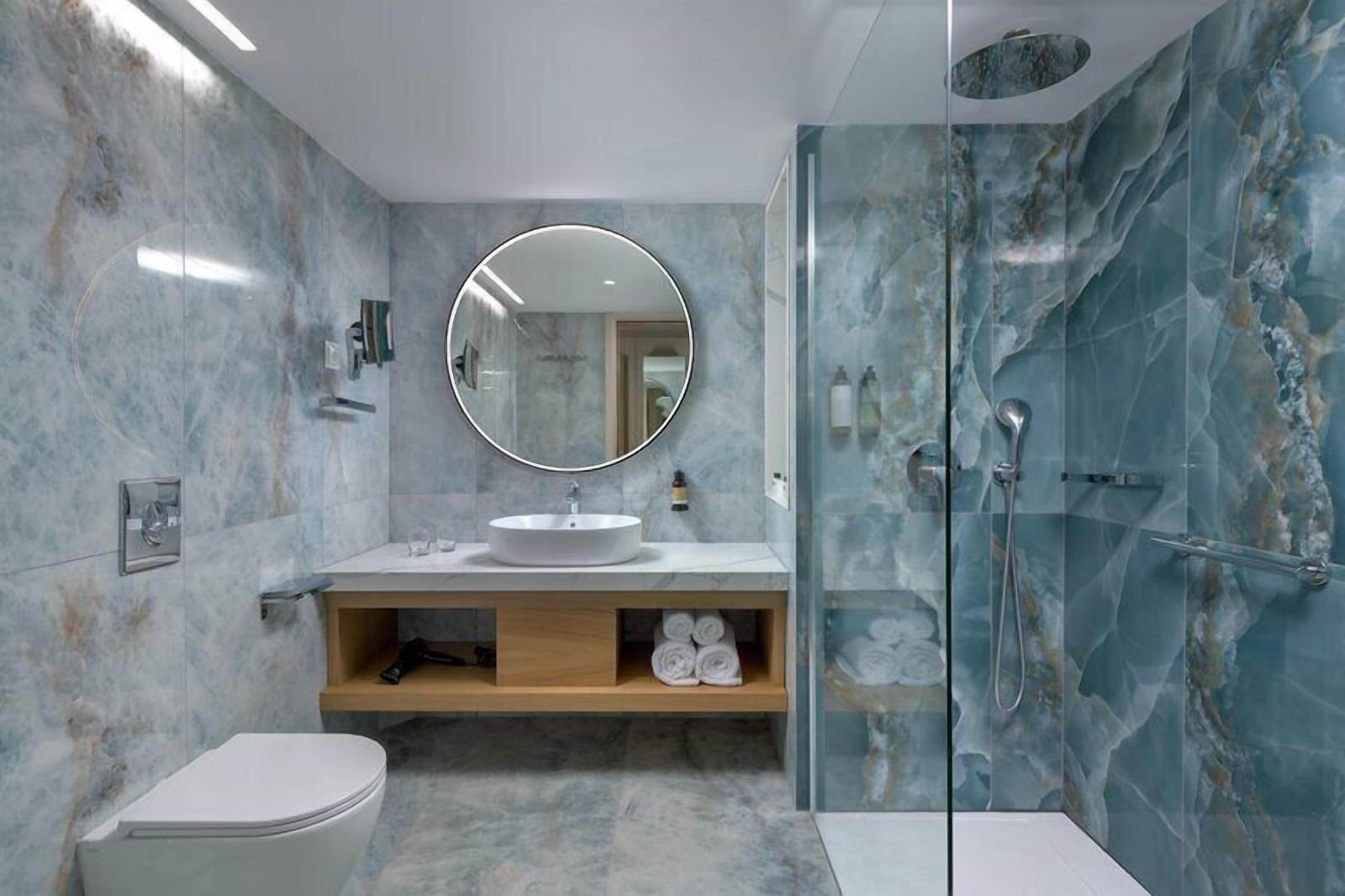 Eco-friendly toiletries, hair dryer, slippers, towels