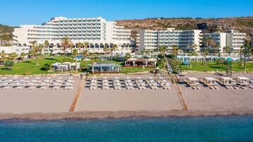 On the beach, beach cabanas, sun loungers, beach umbrellas