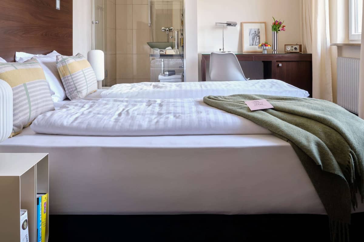 Comfort Twin Room | Hypo-allergenic bedding, in-room safe, desk, laptop workspace