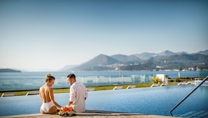 Indoor pool, seasonal outdoor pool, pool umbrellas, sun loungers