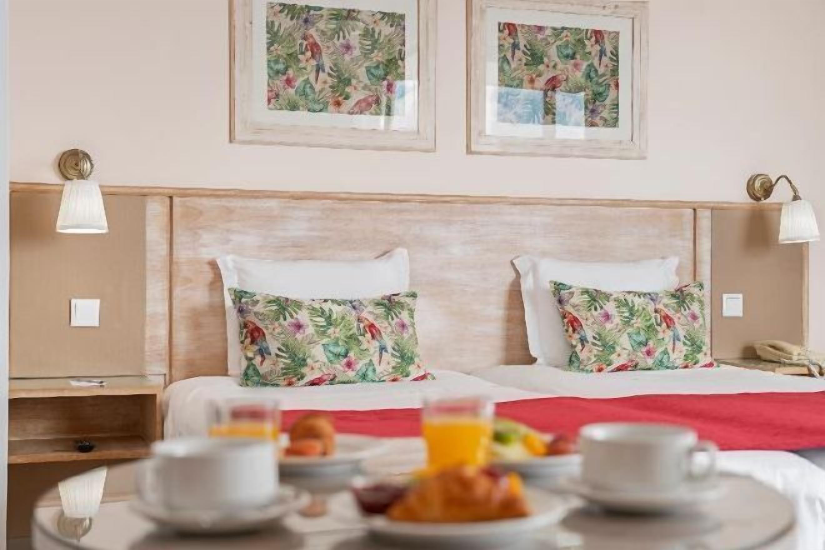 Blackout curtains, iron/ironing board, free cots/infant beds