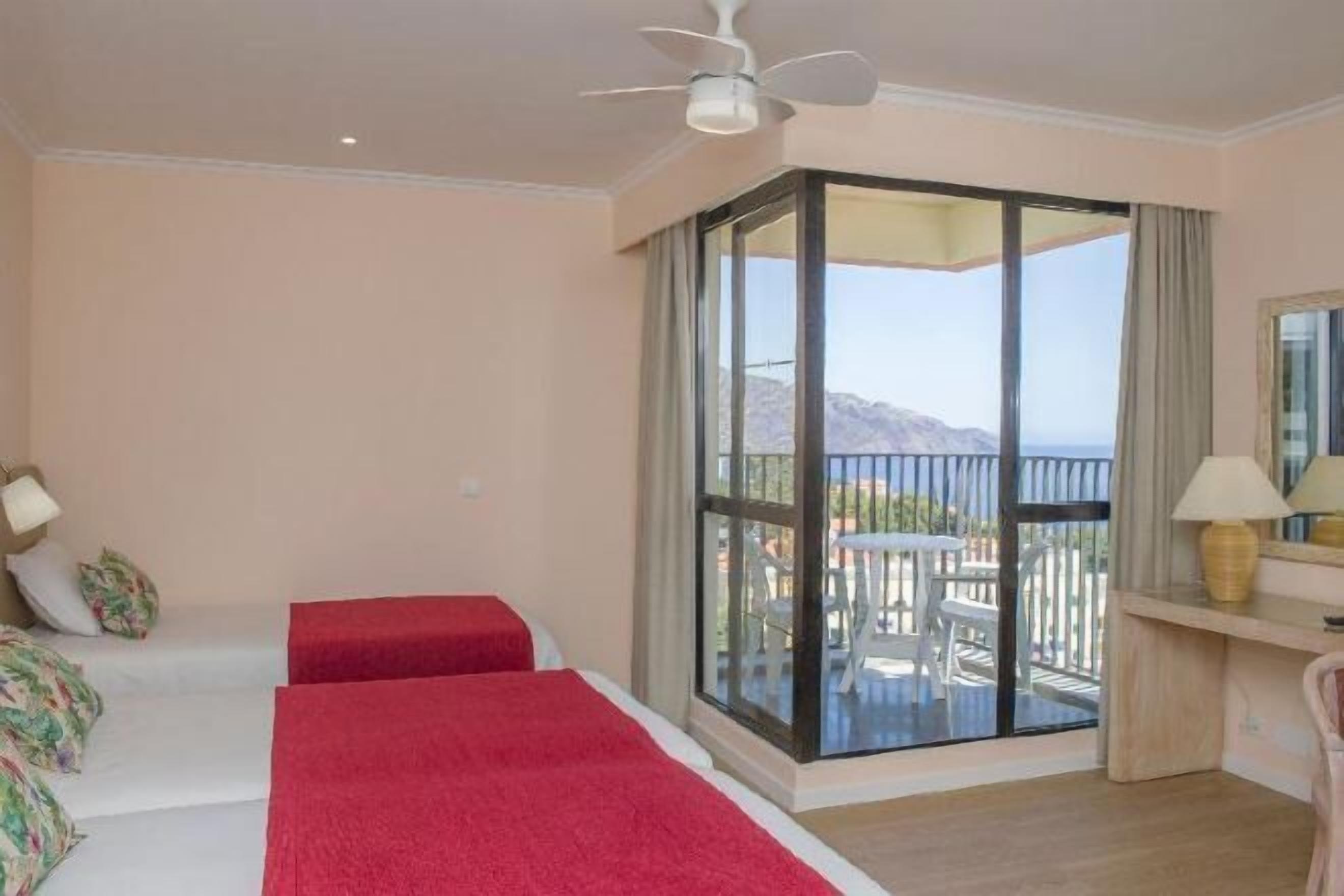 Blackout curtains, iron/ironing board, free cots/infant beds