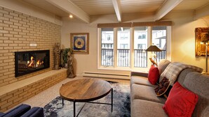 Deluxe Condo, 2 Bedrooms, Fireplace (Chateau Dumont 11) | Living area | Flat-screen TV, fireplace - Chateau Chaumont & Dumont Condominiums by Frias (Aspen)