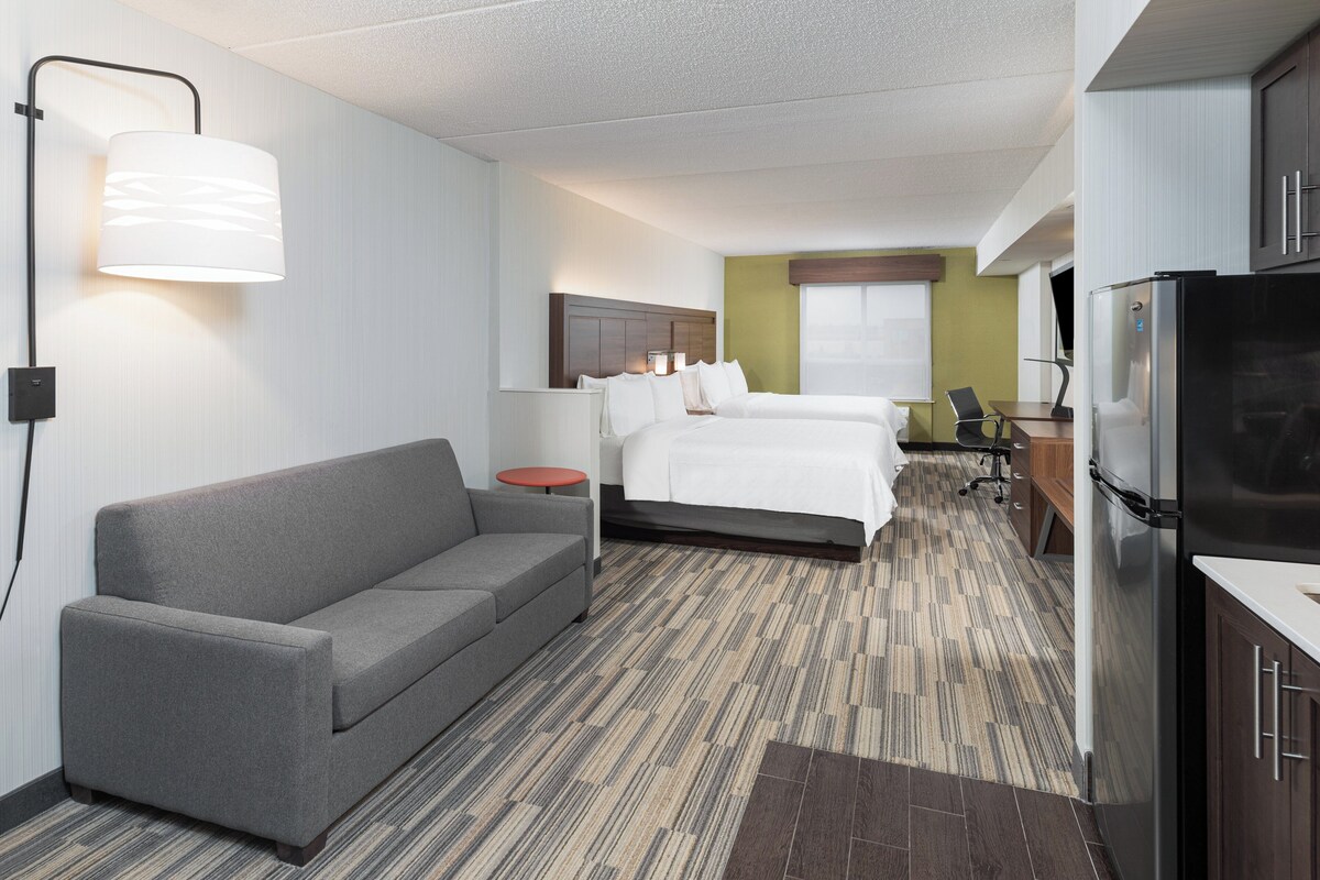 Suite, Multiple Beds | Desk, laptop workspace, blackout drapes, iron/ironing board