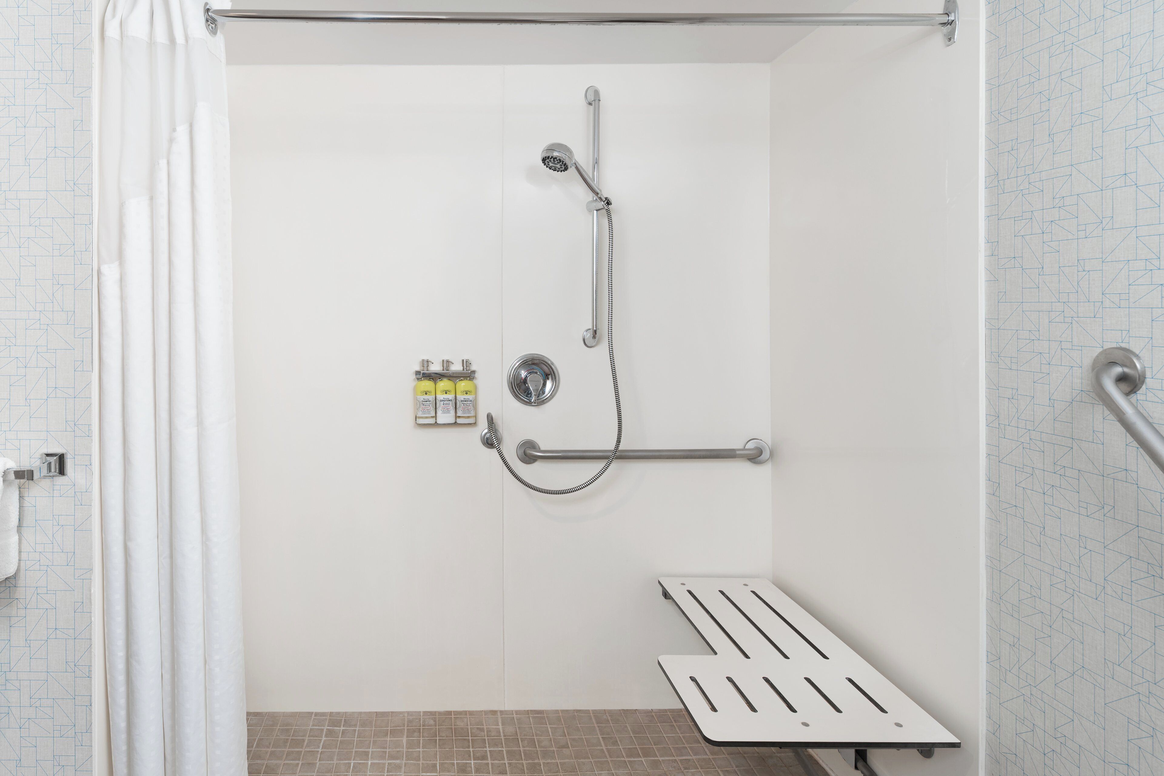 Standard Room, 1 King Bed, Accessible (Mobility) | Bathroom | Shower, designer toiletries, hair dryer, towels