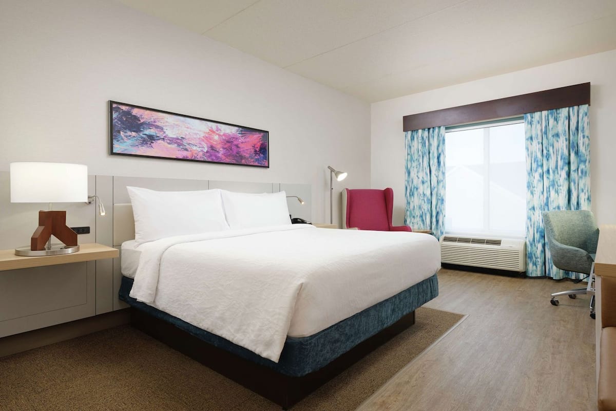 Down duvets, Select Comfort beds, in-room safe, desk
