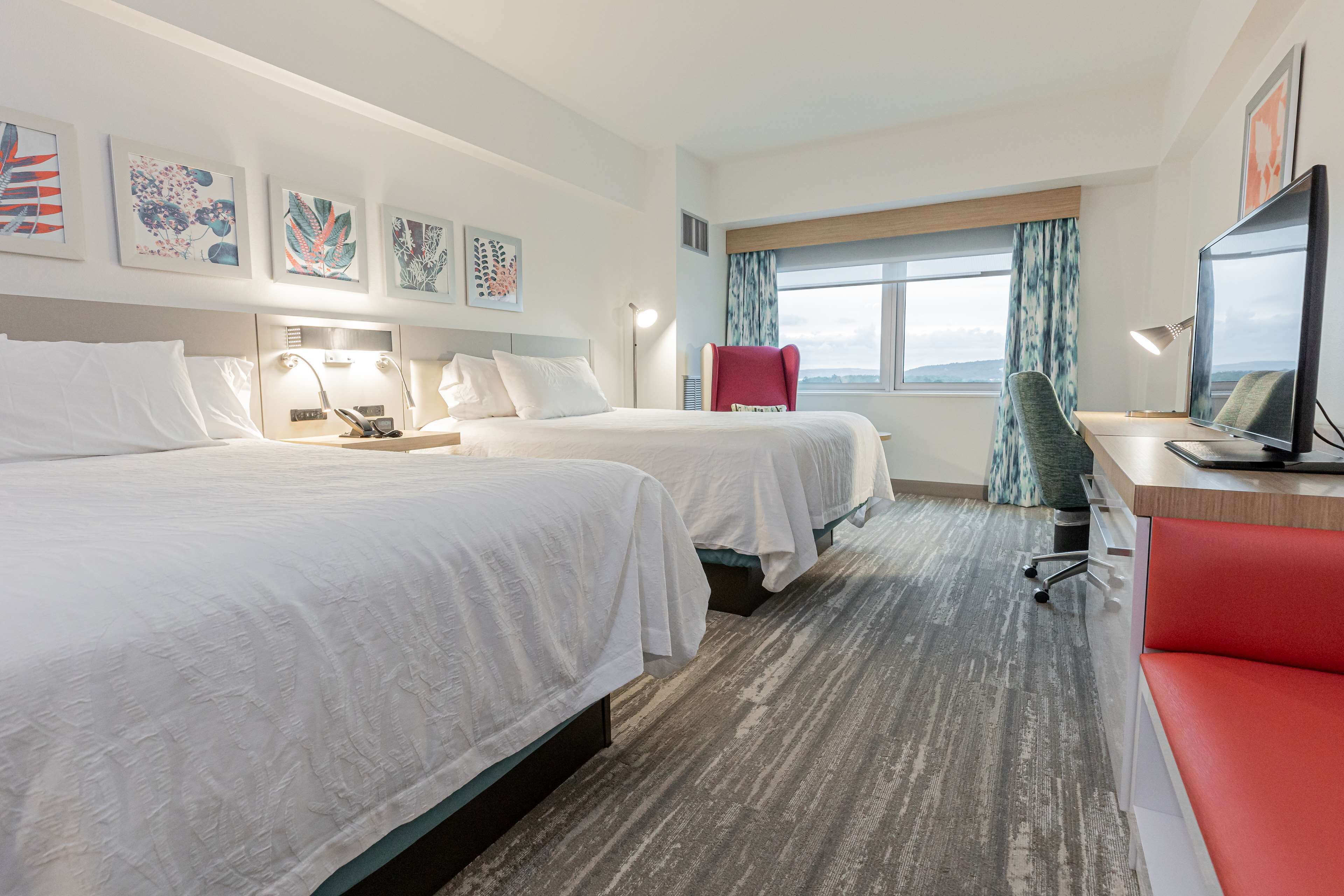 room, 2 queen beds | desk, laptop workspace, iron/ironing board, free cots/infant beds