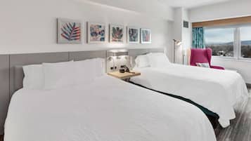 Desk, laptop workspace, iron/ironing board, free cribs/infant beds