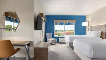 Suite, Multiple Beds | Desk, laptop workspace, blackout drapes, iron/ironing board