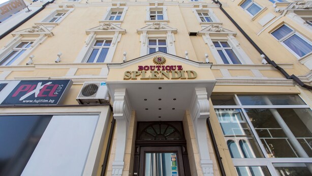 A building with a sign reading "BOUTIQUE SPLENDID" and a "PIXEL PLUS" sign below it. - Boutique Splendid Hotel (Varna)