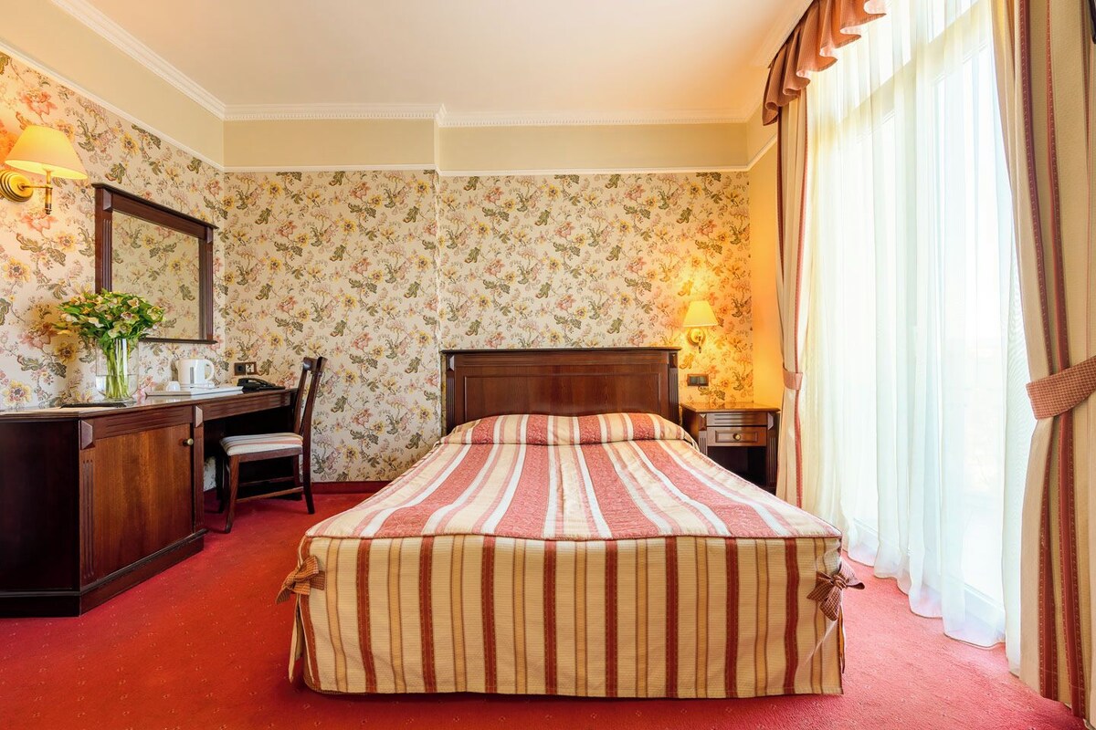 Minibar, desk, iron/ironing board (on request), WiFi (surcharge)