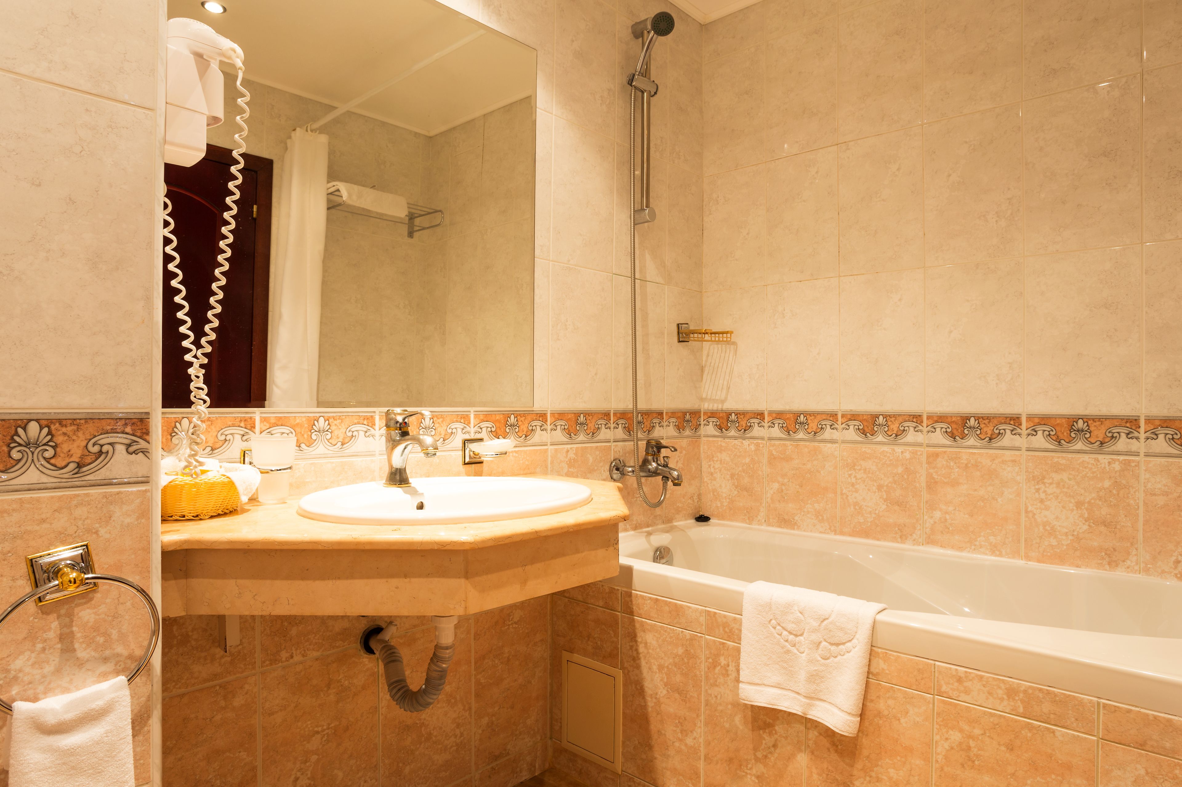 combined shower/bathtub, free toiletries, hair dryer, bathrobes