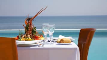 Breakfast, lunch, dinner served; beach views