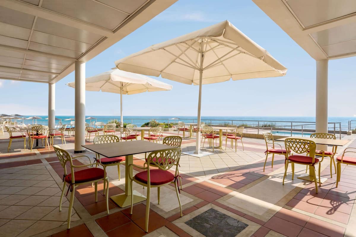 breakfast, lunch, dinner served; beach views