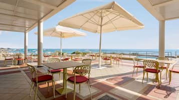 Breakfast, lunch, dinner served; beach views