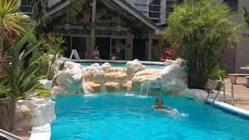 Outdoor pool, pool umbrellas, sun loungers