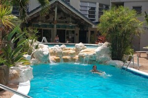 Outdoor pool, pool umbrellas, sun loungers