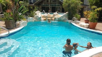 Outdoor pool, pool umbrellas, sun loungers