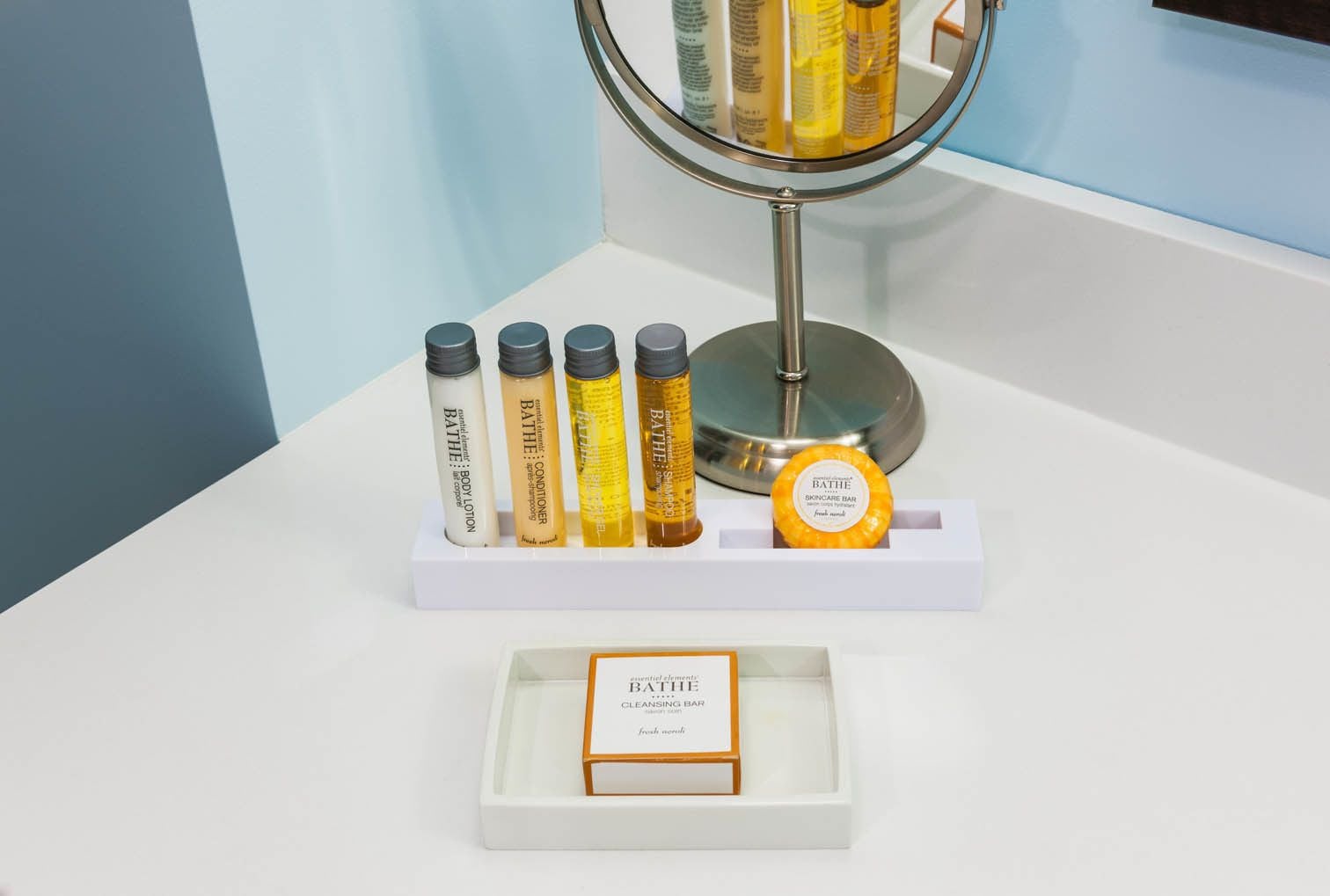 combined shower/bathtub, designer toiletries, hair dryer, towels