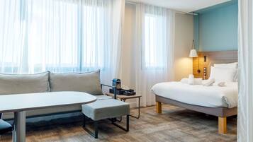 Suite ejecutiva, 1 cama King size | Minibar, caja de seguridad en la habitación y escritorio