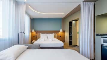 Suite superior, 1 cama matrimonial y sofá cama | Minibar, caja de seguridad en la habitación y escritorio