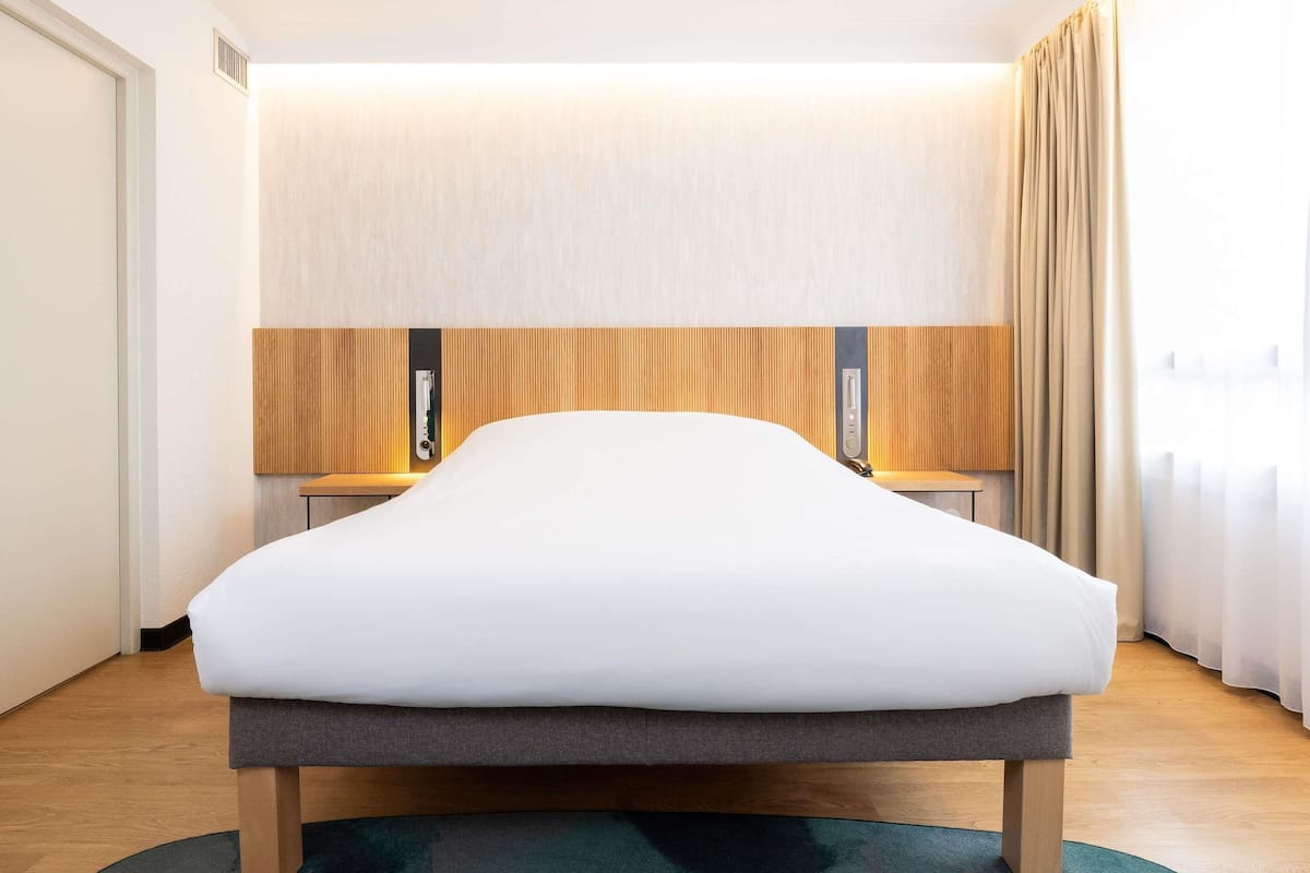 Premium bedding, memory foam beds, minibar, in-room safe