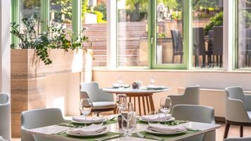 Breakfast, lunch, dinner served; garden views