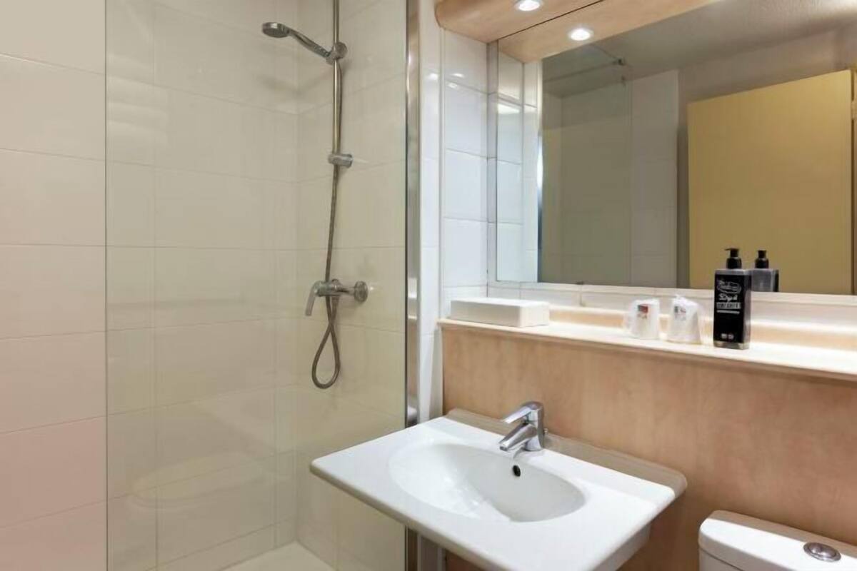 Bathroom | Bathtub, eco-friendly toiletries, towels