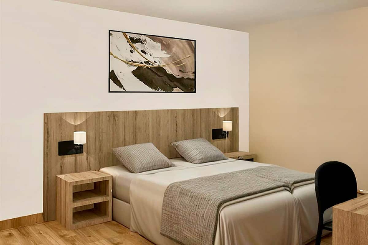 Economy Double Room | In-room safe, desk, laptop workspace, free cots/infant beds