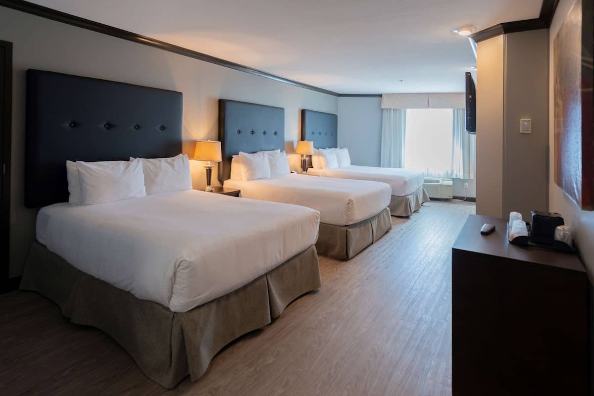 suite, multiple beds, non smoking, jetted tub (walk-in shower) | premium bedding, blackout curtains, iron/ironing board, free wifi