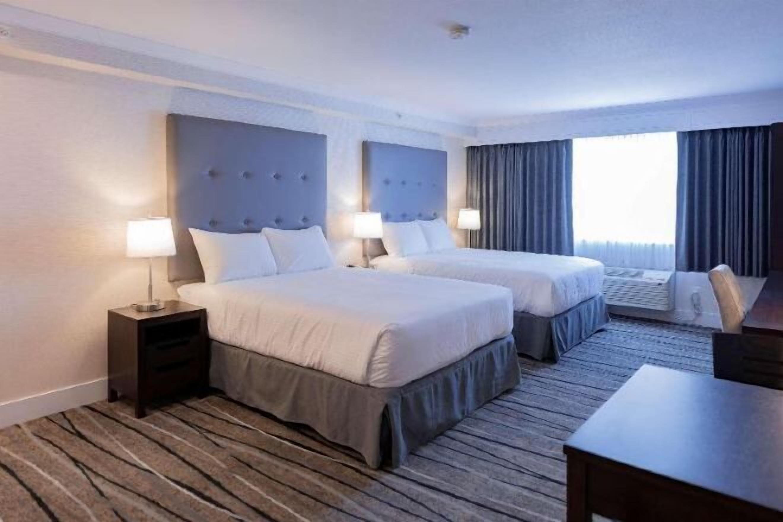 Premium bedding, blackout curtains, iron/ironing board, free WiFi