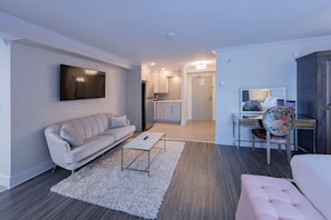 Premium bedding, blackout curtains, iron/ironing board, free WiFi