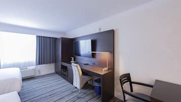 Premium bedding, blackout curtains, iron/ironing board, free WiFi