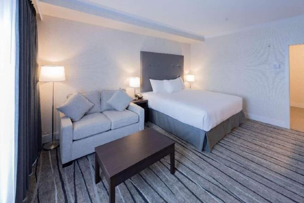 Premium bedding, blackout drapes, iron/ironing board, free WiFi