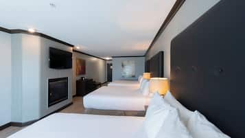 Premium kamer, Meerdere bedden, open haard | Luxe beddengoed, verduisterende gordijnen, een strijkplank/strijkijzer